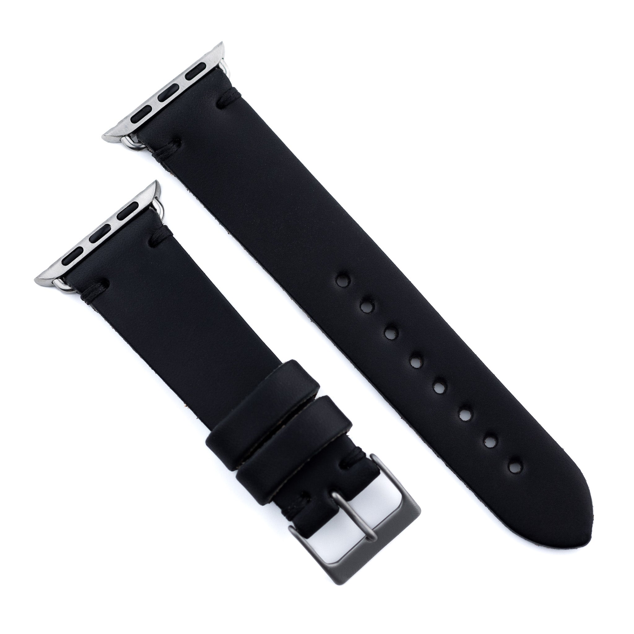 Black leather watch strap with silver buckle on a white background