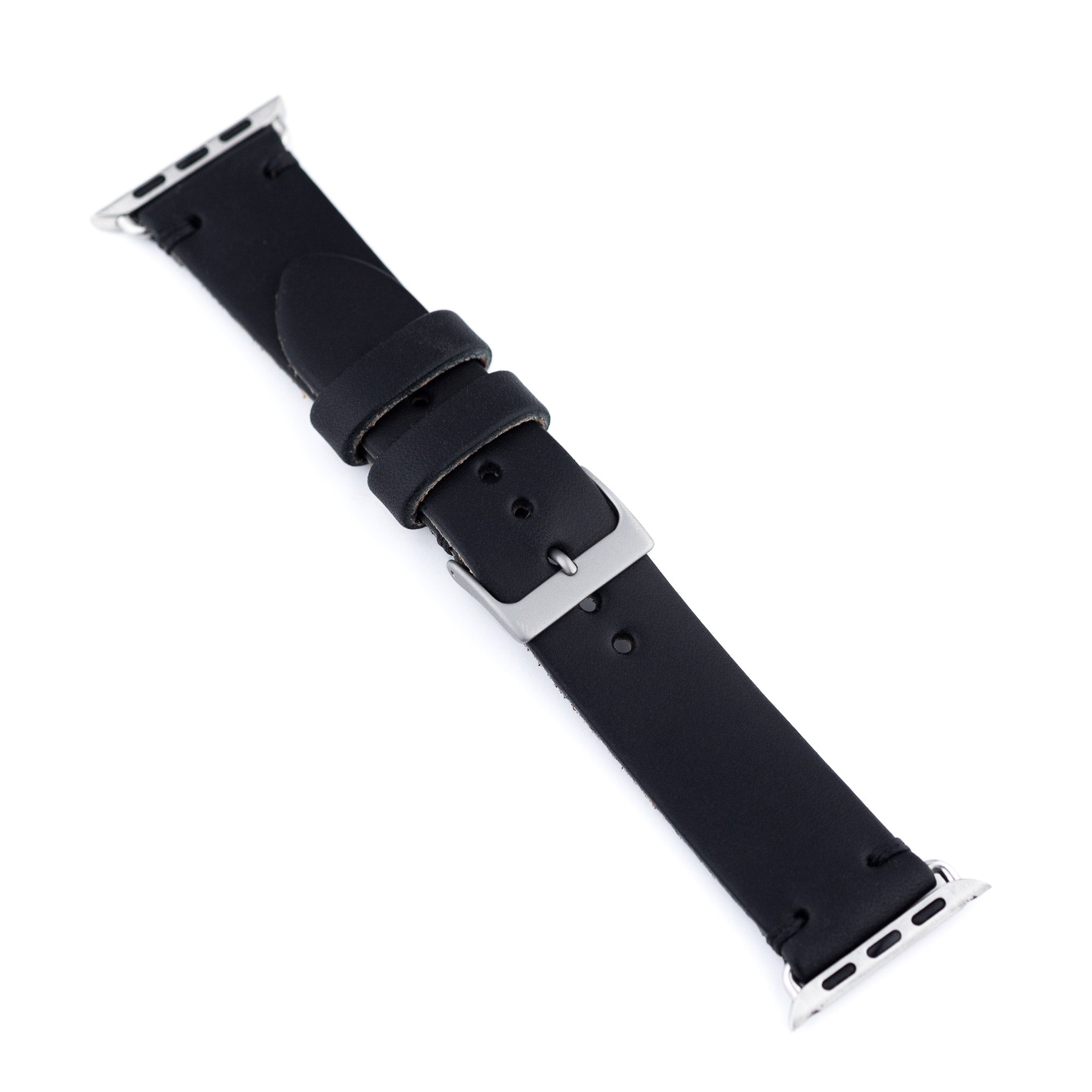 Black leather watch strap with silver hardware on a white background