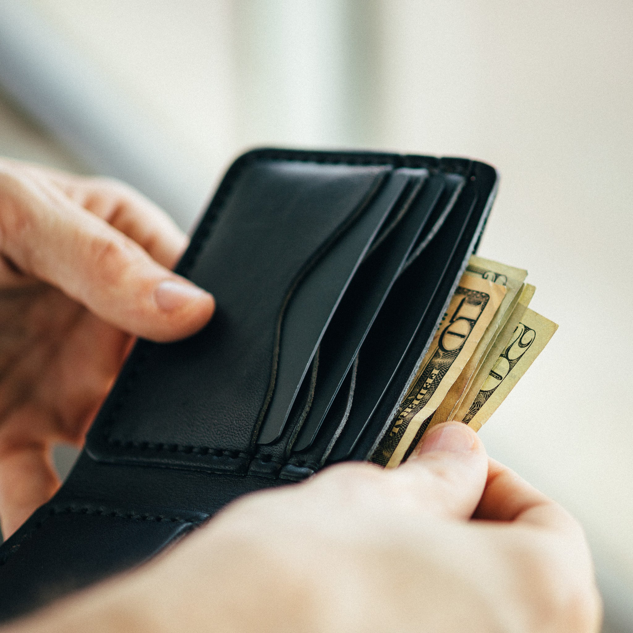 Leather wallet with some money